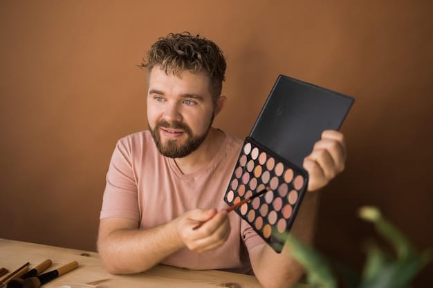 A man in a makeup store, holding several concealer tubes and comparing their shades to his skin. He is focused and carefully examining the products under the store's lighting.