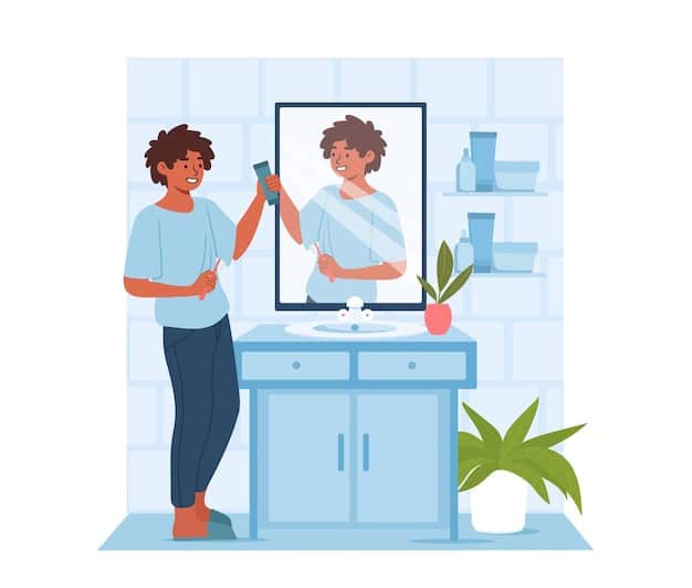 A man washing his face in front of a mirror, using a gentle cleanser. His expression is focused, and the bathroom scene is clean and well-lit, emphasizing the importance of starting with a clean base.