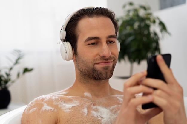 A man applying tinted moisturizer to his face in a well-lit bathroom, demonstrating the application process for achieving a natural-looking base.