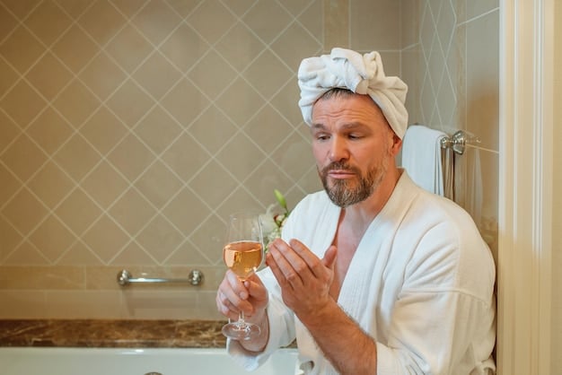 A man is shown washing his face with a gentle cleanser in a brightly lit bathroom. He has a focused and meticulous expression.