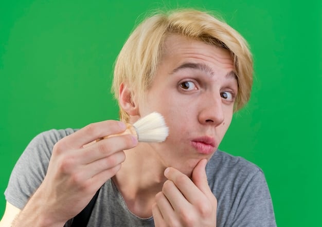 A man gently blotting his face with a blotting paper, showcasing a quick and effective way to control shine and maintain a fresh makeup look.