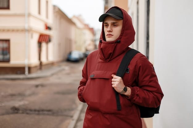 A person wearing a layered athleisure outfit consisting of a moisture-wicking base layer, a zip-up hoodie, and a lightweight windbreaker. They are also wearing performance leggings and sneakers.