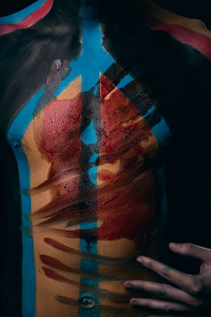 A close-up shot of a person's torso showing a detailed view of a canvas unisex crossbody bag. The shot highlights the texture of the canvas, the stitching details, and the adjustable strap. The environment is a well-lit studio, emphasizing the quality and design of the bag.
