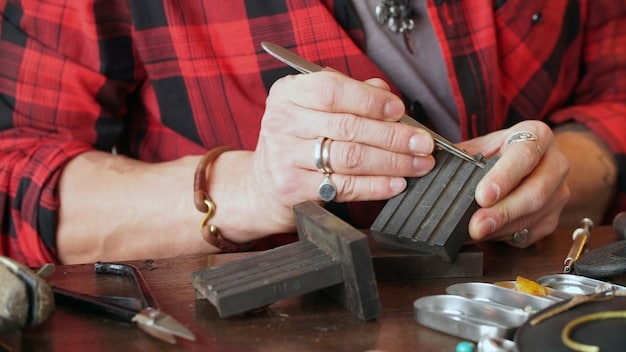 A jewelry artisan carefully crafting a minimalist unisex bracelet in their workshop, using traditional tools and techniques. The focus is on the artisan's hands and the precision of their work, highlighting the craftsmanship involved.