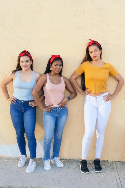 Three diverse individuals wearing different styles of unisex belts to accentuate their waistlines: one with an hourglass figure in a wide leather belt, one with a straighter figure in a medium canvas belt, and one in a non-binary ensemble with a chain belt.