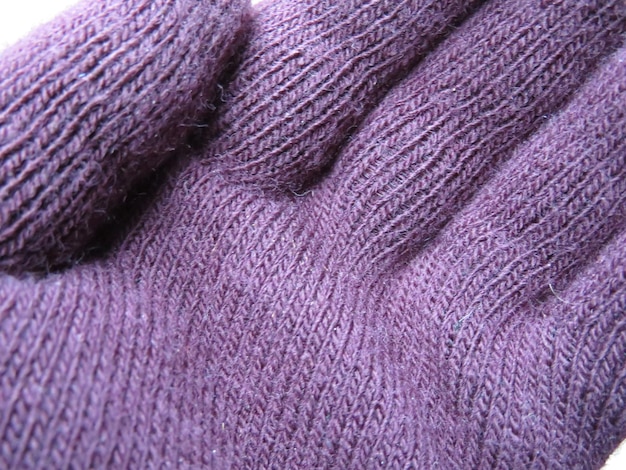 A close-up of various types of sock materials, including cotton, wool, bamboo, and synthetic blends. The image highlights the texture and weave of each material.