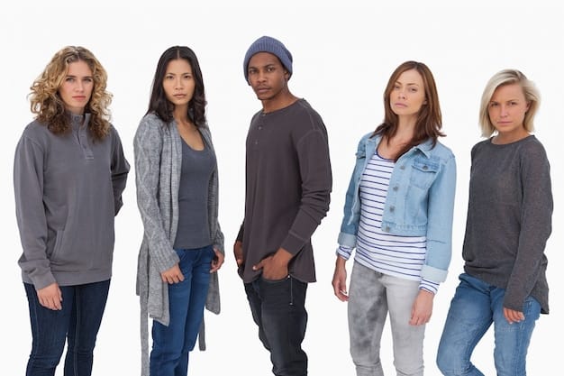 A diverse group of people, varying in gender expression, showcasing different outfits from a gender-neutral clothing line. The focus is on the variety of styles and how the same garments can be adapted to different individuals and body types. The background is a clean, modern studio setting.
