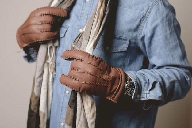 Close-up of hands sorting through a rack of vintage clothing in a thrift store, focusing on textures like denim, leather, and soft cotton