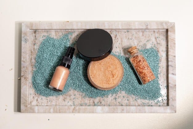 A display of various high-quality hydrating makeup products, including a serum foundation, a creamy concealer, and a translucent setting spray, neatly arranged on a minimalist vanity.