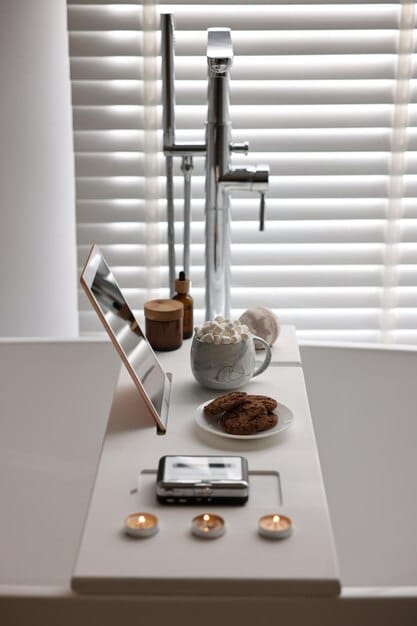 A clean, modern bathroom vanity with high-end men's grooming products, including a subtle foundation and concealer, neatly arranged with a minimalist aesthetic.