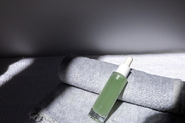 A clean, sleek bottle of men's broad-spectrum sunscreen placed on a granite countertop, next to a fresh towel and a glass of water, emphasizing a modern daily routine.
