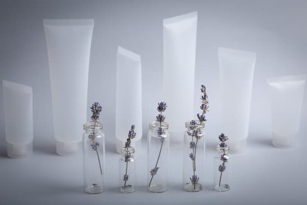 A diverse array of skincare product bottles and tubes featuring ingredients like niacinamide, salicylic acid, and retinoids, arranged neatly on a clean white surface with soft, diffused lighting.