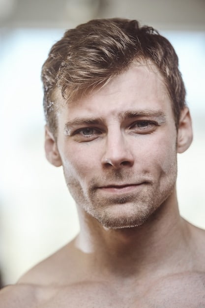 A detailed, clear shot of a man's face, focusing on his healthy, radiant skin. His complexion appears smoother, pores less visible, and signs of stress or dryness are absent, reflecting the positive results of a consistent skincare routine.