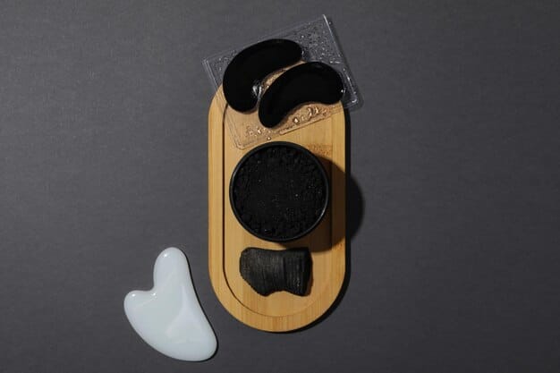 A detailed flat lay of various men's skincare products including a facial cleanser, moisturizer, and a modern facial cleansing brush, all neatly arranged on a dark, minimalist background.