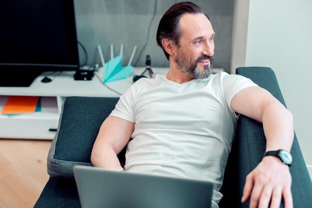 A man in his late 30s or early 40s sits comfortably while a practitioner uses an advanced HIFU device on his jawline and neck. The device is sleek and futuristic, and the man has a relaxed, confident expression, indicating a non-invasive and comfortable procedure. The background is a clean, modern clinic setting.