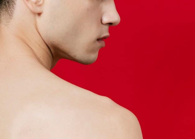A detailed, clear close-up of a masculine jawline, showcasing the precise definition achieved through advanced fat reduction and sculpting techniques. The skin is smooth and taut, highlighting a chiseled contour. The image is taken in a professional clinical setting under bright, neutral lighting.