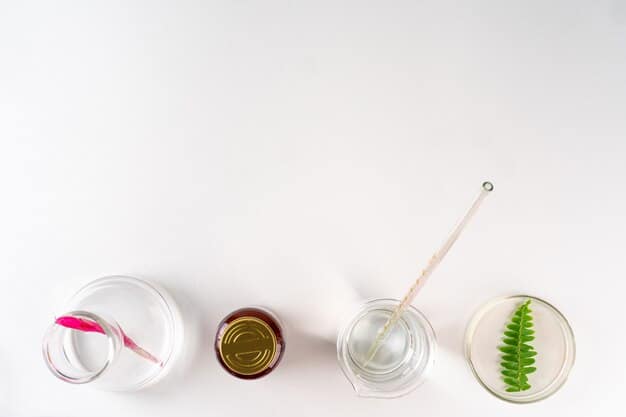 Various natural ingredients like shea butter, hyaluronic acid, and jojoba oil artfully arranged in a minimalist, clean laboratory setting.