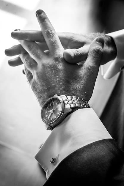 A close-up studio shot of a classic men's dress watch with a white dial, black Roman numeral markers, a slim gold case, and a black alligator leather strap. The background is a blurred, warm gradient, focusing attention on the watch's elegant details and smooth lines. The shot emphasizes the luxury and timeless design of the dress watch, which is a significant element of The Ultimate Guide to Men's Watch Styles: Finding Your Perfect Timepiece in 2025.