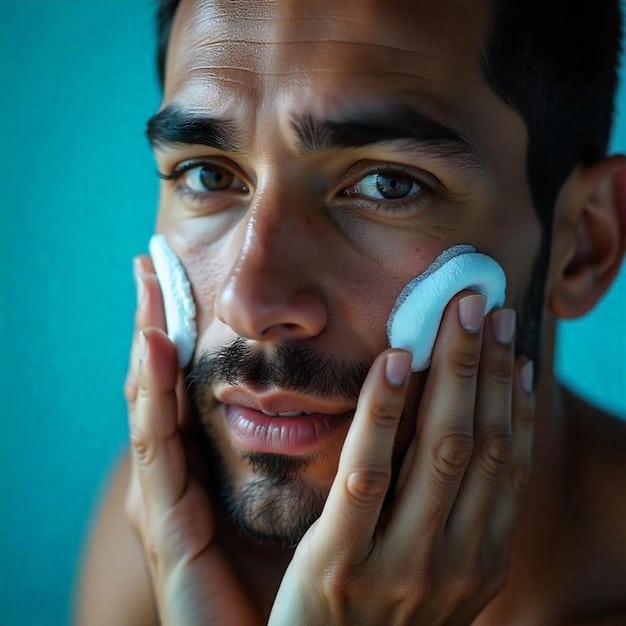 A man gently cleansing his face with a mild cleanser, focusing on the soft motions and the creamy texture of the product. The background should show a clean and minimalist bathroom setup, emphasizing simplicity and care in skincare. Key tags: mild cleanser, man washing face, gentle skincare, hydrating cleanser.