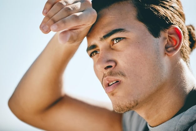 A man applying sunscreen to his face before an outdoor workout. He is wearing athletic clothing and is in a sunny environment, emphasizing the importance of sun protection for men's skincare for the gym: protect your skin during and after workouts.