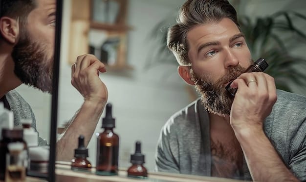 A man with a neatly trimmed and well-maintained beard is shown applying beard oil with his hands in a bathroom setting. The focus is on his hands massaging the oil into his beard, highlighting the grooming process and relevance of The Comeback of Classic Styles: Are Traditional Grooming Techniques Making a Return?.